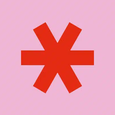 A large red asterisk symbol is centered on a pink background.