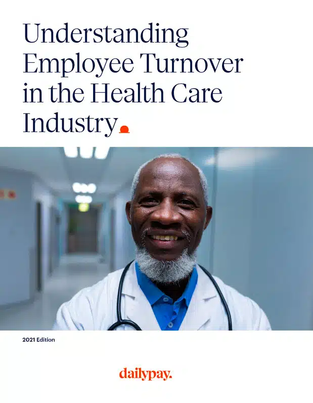 Smiling older man in a lab coat and stethoscope stands in a hallway. Text above reads "Understanding Healthcare Turnover Rates," with "dailypay" logo at the bottom.