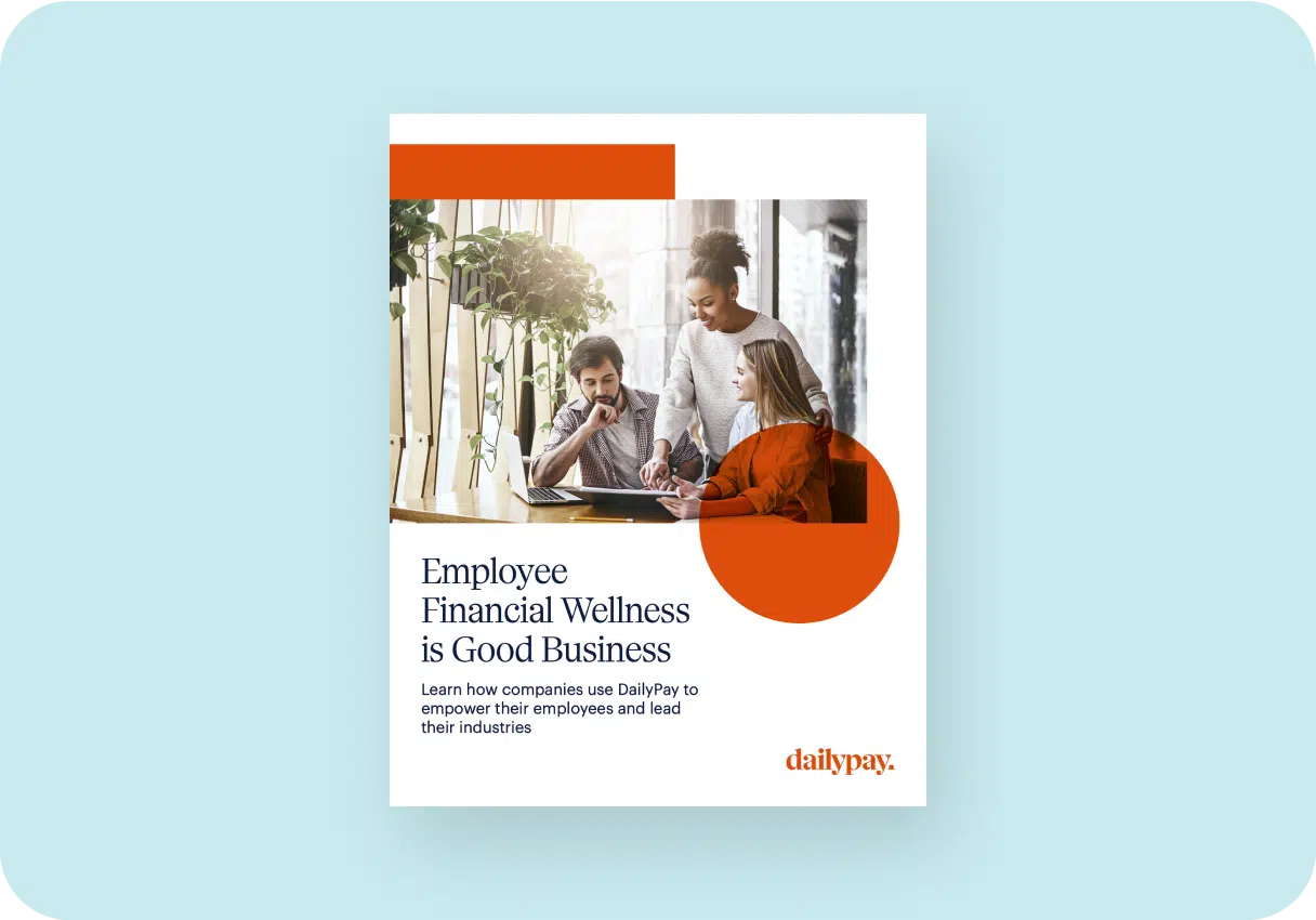 Three people discuss work at a table surrounded by plants. Text on the image reads "Employee Financial Wellness is Good Business" with the daily pay logo at the bottom right.
