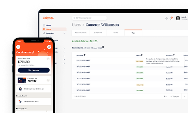 A smartphone and laptop display financial account balances and transaction details on a banking or finance management platform.