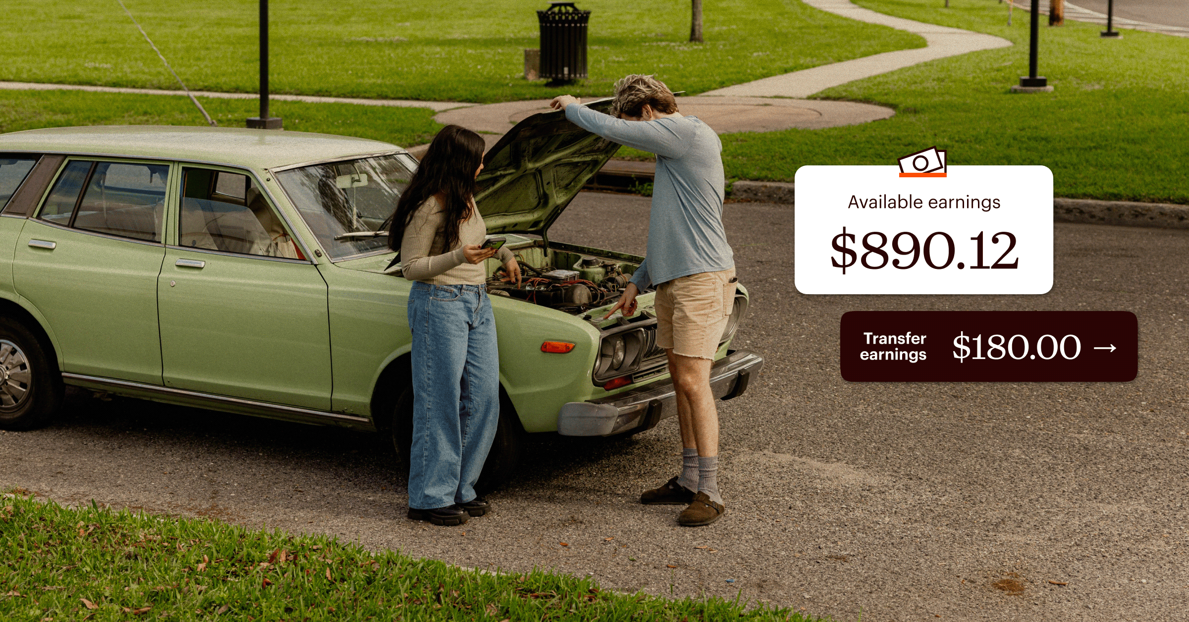 Two people stand by an open car hood in a park, with a digital overlay showing “Available earnings $890.12” and a “Transfer earnings $180.00” button.